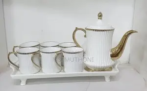 Elegant White 8 PCS White Ceramic Tea Sets With a Gold Rim*