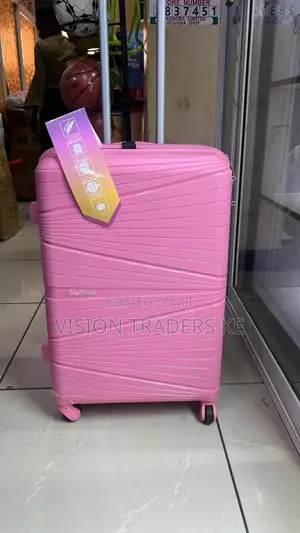 Hot Pink Medium Rubber Suitcase 
66cm Height
