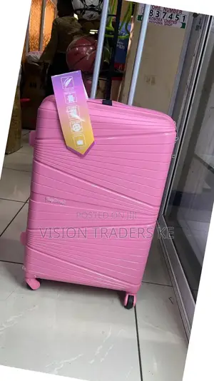 Hot Pink Medium Rubber Suitcase 
66cm Height