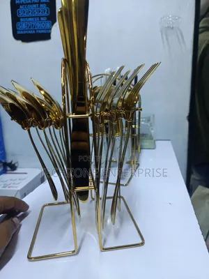 Unique 24pc Gold Stainless Steel Cutlery Set .,