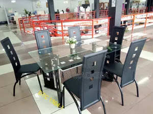 Executive 6 Sitter Glass Dinning Table With Leather Seat