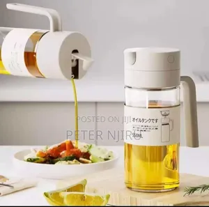 Automatic Glass Oil Jar/Dispenser.
550ml
*Off-White*