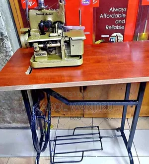 Suitable Overlock Sewing Machine Complete With Table