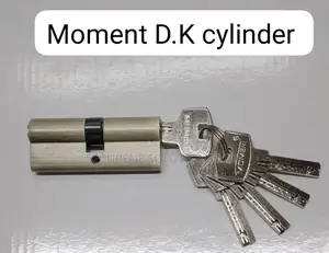 Moment D.K Cylinder" Door Lock With Its Corresponding Keys.