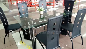 Executive 6 Sitter Glass Dinning Table With Leather Seat