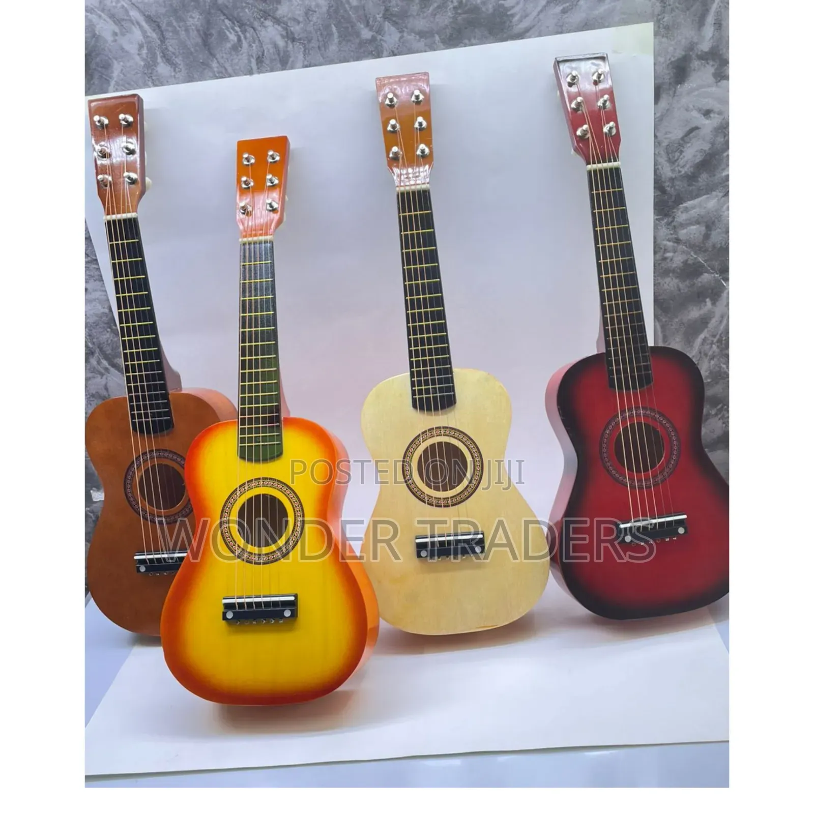 .6 Strings Acoustic Guitar 23 Inches Long.