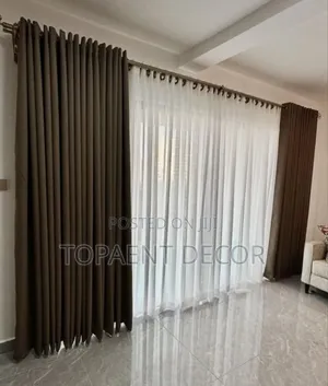 When Coziness Meets Elegance Brown Window Curtains and White Sheers
