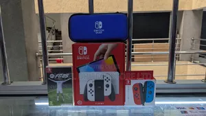 Nintendo Switch Oled+ Joy Cons+ Fc25 + Carrying Case