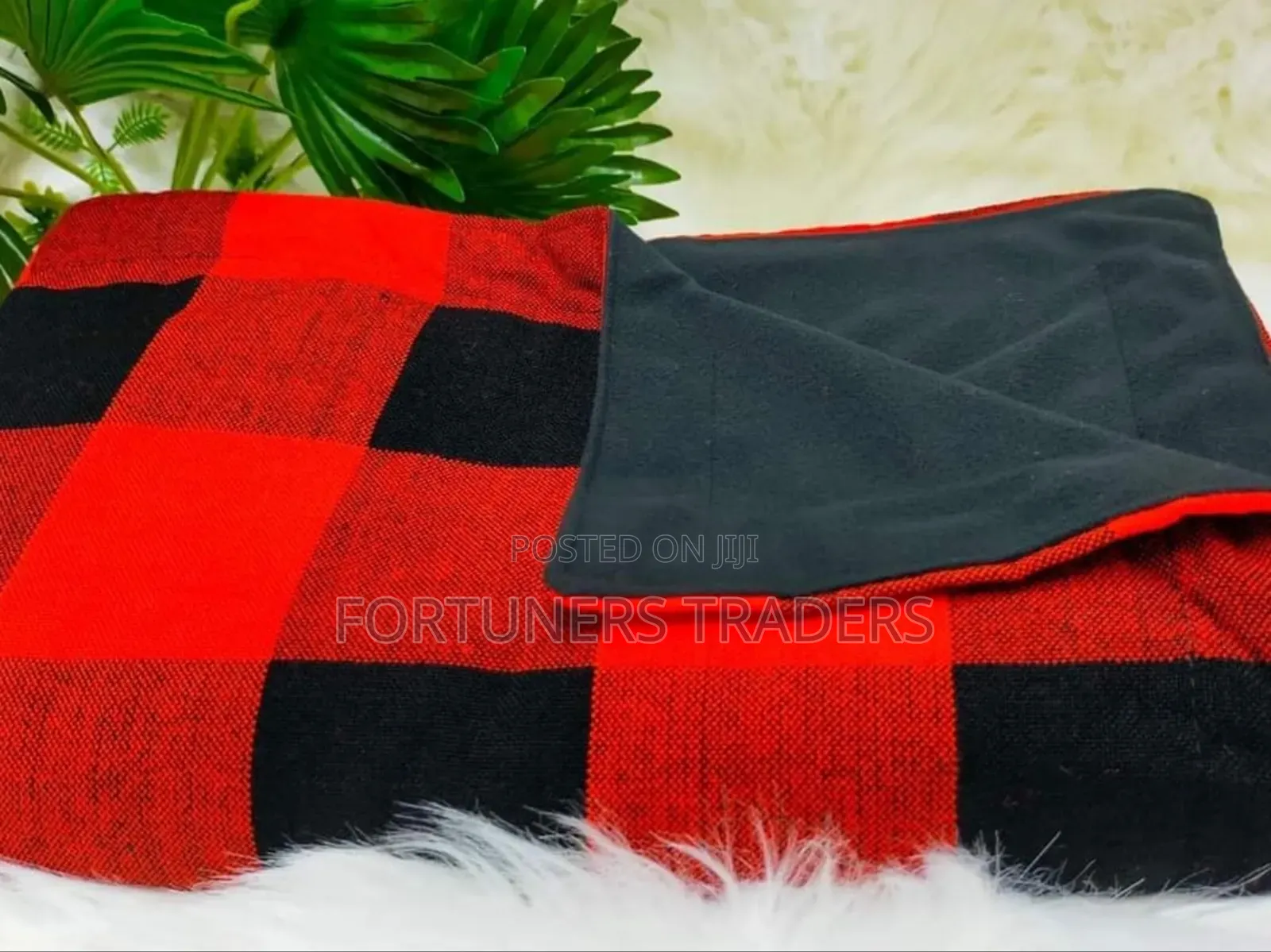 Maasai Red Shuka Black Fleece Blanket.
