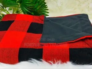 Maasai Red Shuka Black Fleece Blanket.
