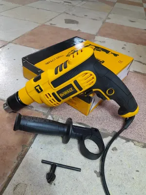 Commercial Dewalt Impact Drill 750 Watts And 2 Free Bits