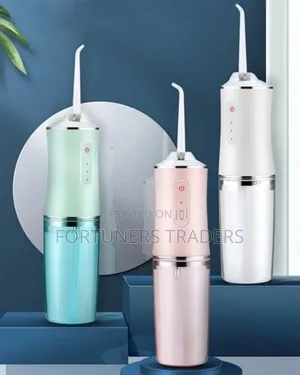 Oral Irrigator With 4 Nozzle Tips