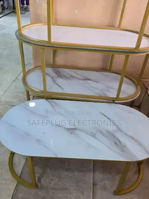 Oval Glass-Effect Marble Table –