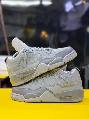 The Air Jordan 4 Retro "Wet Cement" Sneakers
