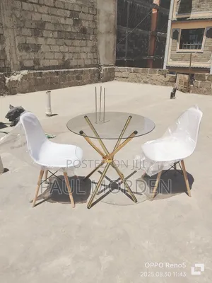 White Eames Chair With Glass Table