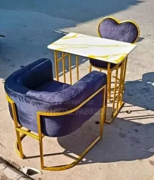Manicure Set, Table and Navy Blue Seats With a Gold Frame.