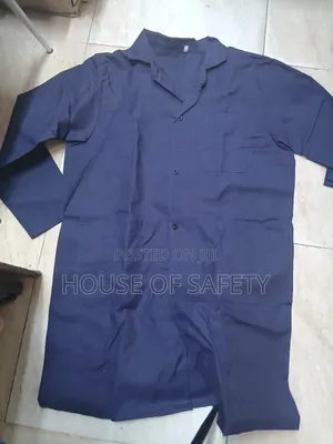 Brown Dust Coat Has Medium-sized Buttons