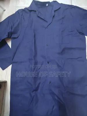 Brown Dust Coat Has Medium-sized Buttons