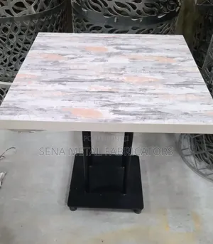 Plate Base Restaurant Table With Glossy Marble Look Top.