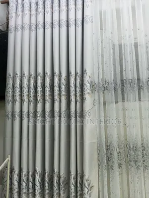 Light Grey Curtain With Leave Like Patches Design