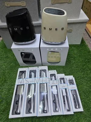 Smeg Premium Stainless Steel Kniife Set With Metal Block.