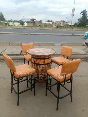 Bar Set, 4 Chairs and a Barrel Round Table 