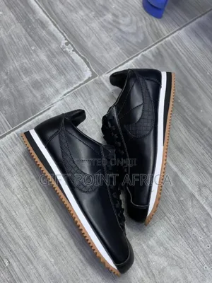 Black Nike Cortez Sneakers
