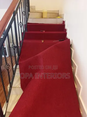 Maroon Stairs Wall to Wall Carpets for Protection Against Slips