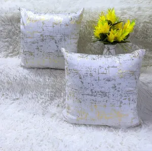 White Pillows With Gold Touch