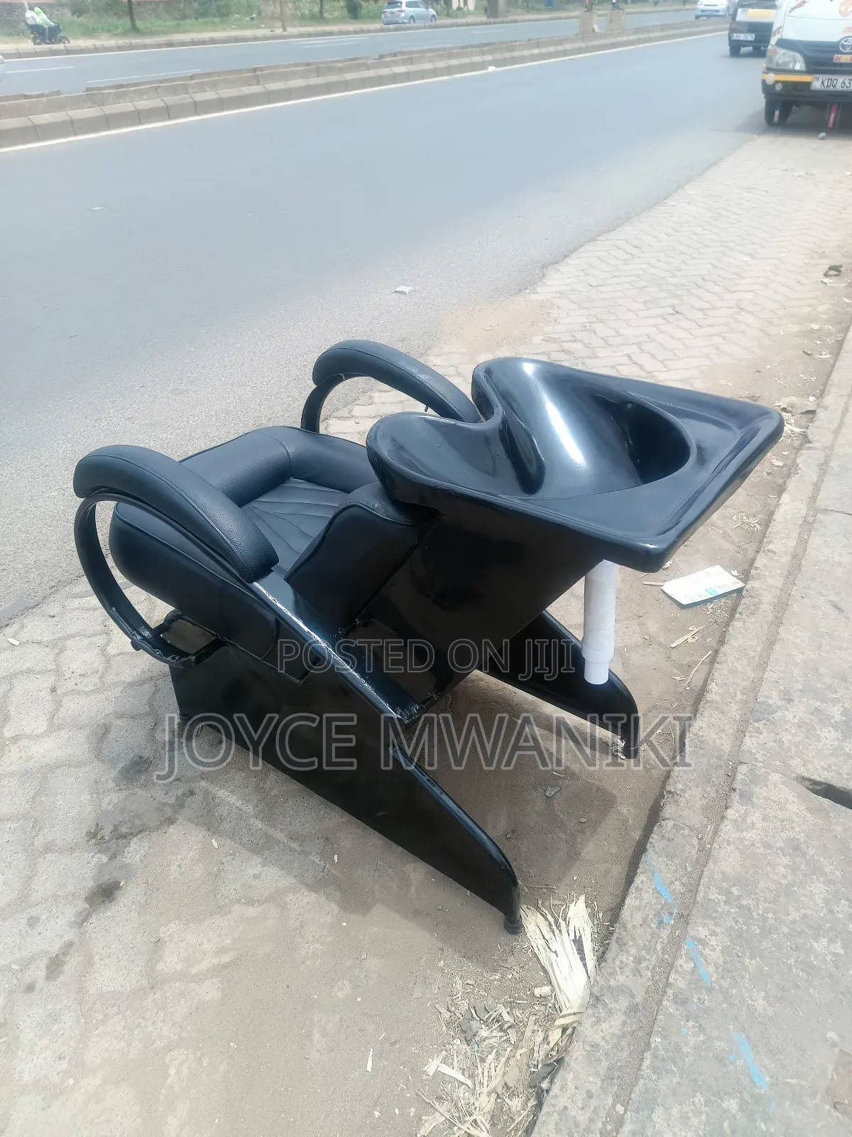 Sink Chair, Black Leather With Outlet Pipe