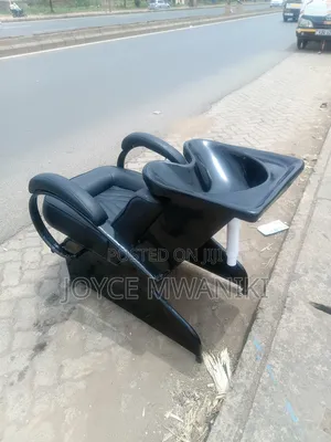 Sink Chair, Black Leather With Outlet Pipe
