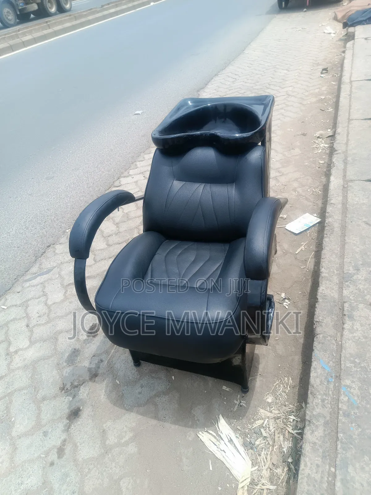 Sink Chair, Black Leather With Outlet Pipe