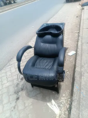Sink Chair, Black Leather With Outlet Pipe