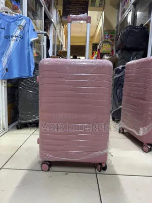 Medium Size Rubber Suitcase Pink 20kgs at 3000 Height 69cm