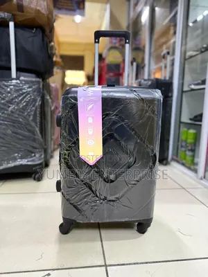 Small Suitcase at 2000. Black Rubber Suitcase