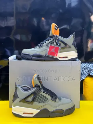 Undefeated  Air Jordan 4
“ Deep Green "