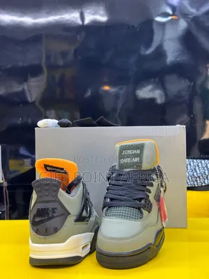 Undefeated  Air Jordan 4
“ Deep Green "