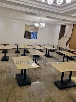 Latest Restaurant Table With Double Metal Leg Stands.