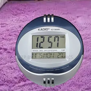 Kadio Digital Round Wall Clock With Alarm, Temperature and Calendar