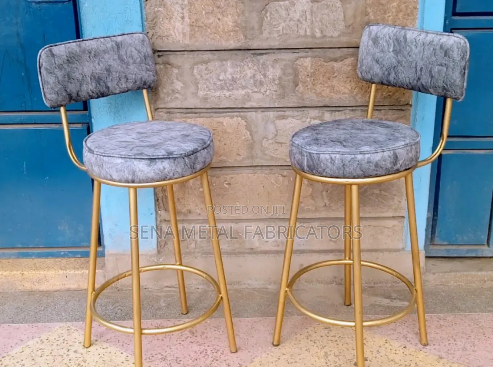 Counter Stools With Grey Patterned Fabric.