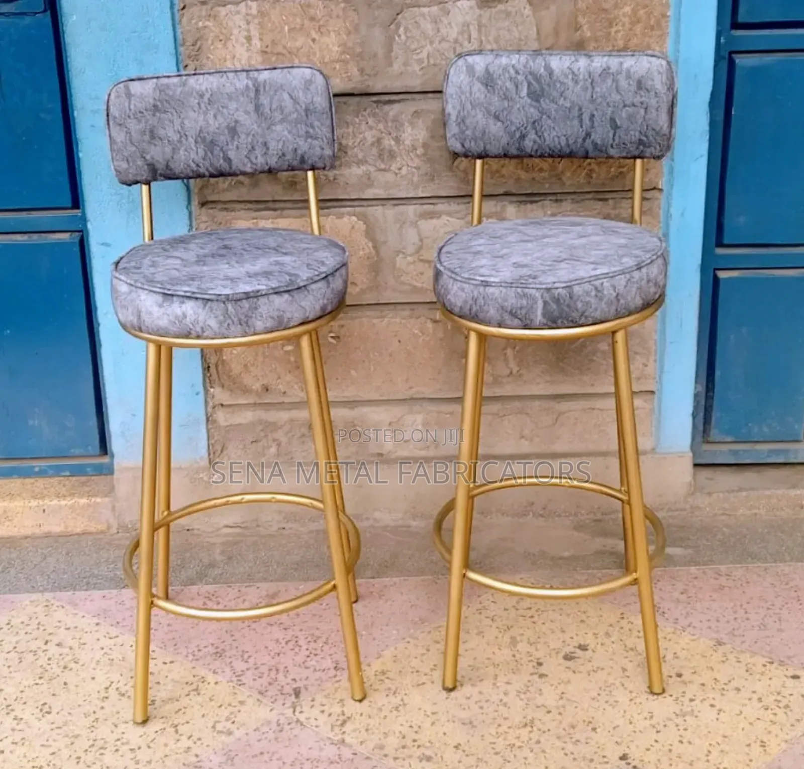 Counter Stools With Grey Patterned Fabric.