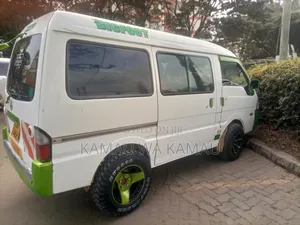 Well Maintained Nine (9) Seater Executive Van for Hire.