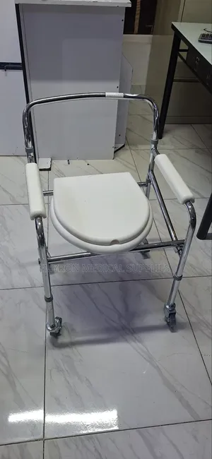 Foldable Commode Chair With Caster Wheels