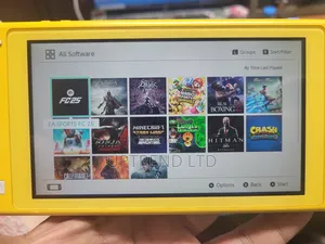 Yellow Chipped Nintendo Swith Lite Chipped With 20 Games