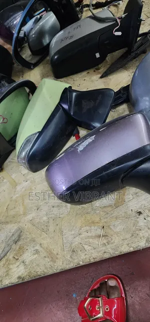 Demio 2015 Sidemirror