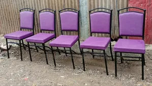 Purple Hotel Chairs With Black Metal Frame.