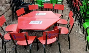 Kindergarten Set With Red Top and Chairs.
