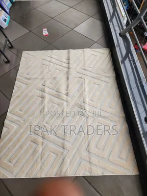 American Carpet 
5by8
Colours 
Cream, Beige and Grey