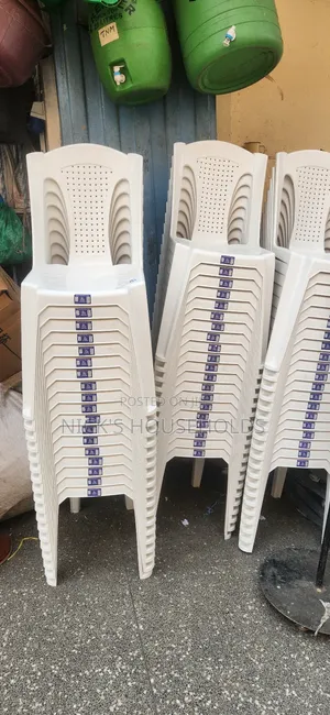 White Shoshona Armless Plastic Chairs,