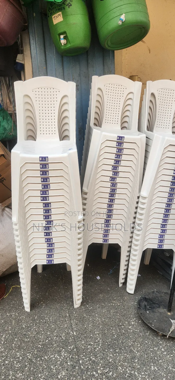 White Shoshona Armless Plastic Chairs,